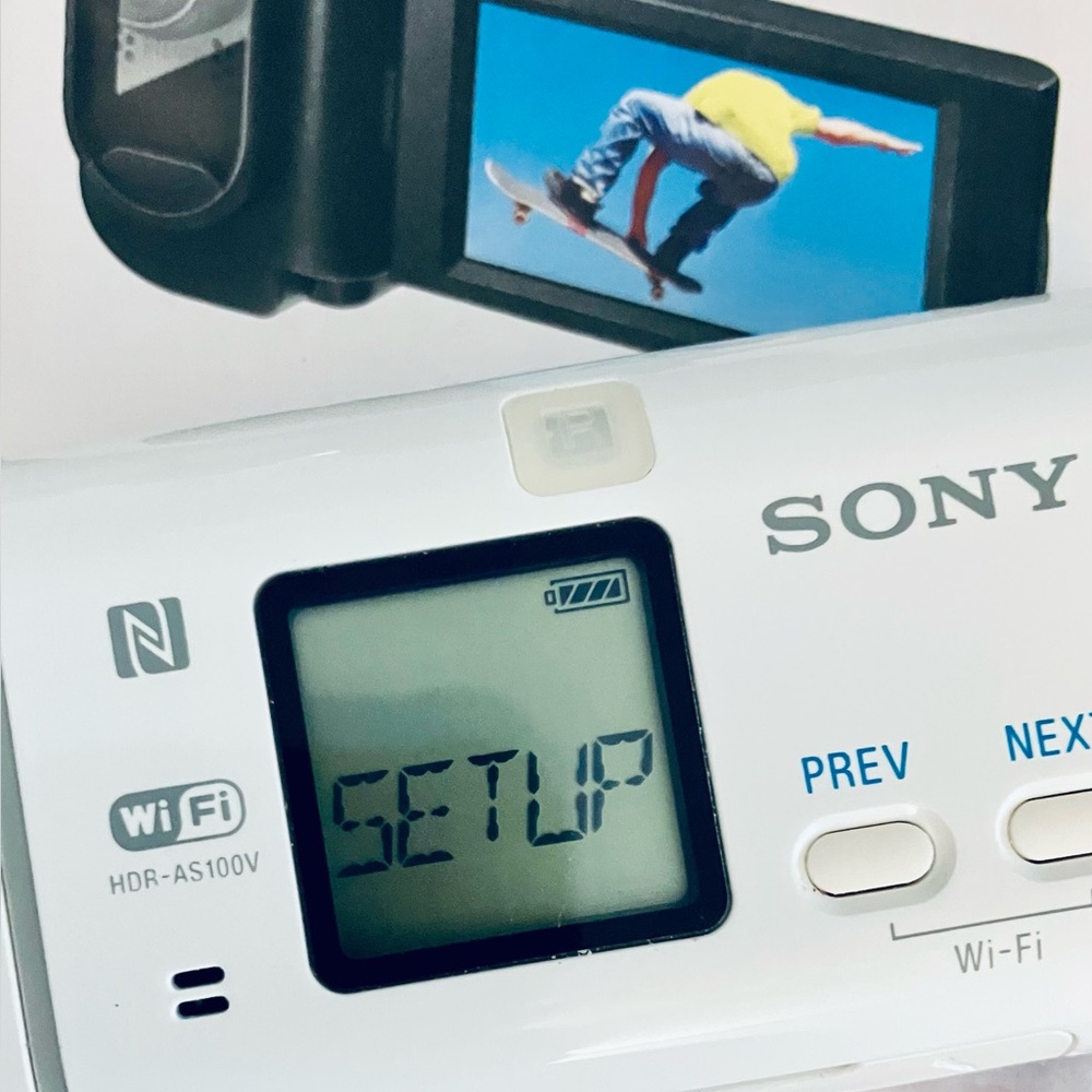Sony HDR-AS100V Action Cam with New Sony AKA-LU1 Grip LCD SCREEN NEW & Open Box